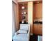 Relaxing sitting area features a comfortable chair, display shelves, and a sink at 2000 N Fashion Show Dr # 2627, Las Vegas, NV 89109