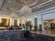 Grand lobby with elegant chandeliers and ornate floral arrangements at 2000 N Fashion Show Dr # 2627, Las Vegas, NV 89109
