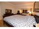Relaxing bedroom with mirrored closet doors and a comfortable bed at 230 E Flamingo Rd # 229, Las Vegas, NV 89169