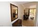Living room leading to balcony, featuring hard wood floors and stylish decor at 230 E Flamingo Rd # 229, Las Vegas, NV 89169