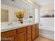 Large bathroom with double sink vanity, soaking tub and a large picture window at 2366 Brockton Way, Henderson, NV 89074