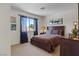 Comfortable bedroom features a cozy bed, natural light and stylish décor at 2366 Brockton Way, Henderson, NV 89074