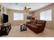 Cozy bonus room features plush carpet, ceiling fan and plenty of space at 2366 Brockton Way, Henderson, NV 89074