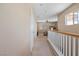 Upstairs hallway featuring neutral walls and carpeted floors leading to bedrooms at 2366 Brockton Way, Henderson, NV 89074