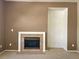 Neutral living room featuring a fireplace and an alcove for decoration at 2366 Brockton Way, Henderson, NV 89074