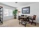 Well-lit office space featuring functional desk and a comfortable chair at 2366 Brockton Way, Henderson, NV 89074