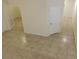 Clean hallway with tile floors, neutral walls, and doors leading to other rooms at 241 Honeywood St, Henderson, NV 89074