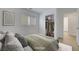 Cozy bedroom with ample natural light, closet, and neutral decor at 2431 Lilac Cove St, Las Vegas, NV 89135