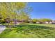 Scenic community park featuring green space, walking paths, mature trees, and gazebo for residents to enjoy at 2431 Lilac Cove St, Las Vegas, NV 89135