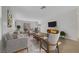 Bright living room with stylish furniture, open floorplan, and hardwood floors at 2431 Lilac Cove St, Las Vegas, NV 89135