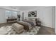 Comfortable main bedroom with two windows and a neutral color palette at 2431 Lilac Cove St, Las Vegas, NV 89135