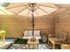 Private patio featuring lounge area, accent seating, and decorative elements at 2530 Catallo St, Henderson, NV 89044