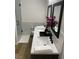 Modern bathroom with dual sinks, quartz counters, stylish fixtures, and a glass-enclosed shower at 332 Dockside Ct, Las Vegas, NV 89145