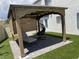 Relaxing gazebo features stylish seating, perfect for enjoying outdoor tranquility and sunshine at 332 Dockside Ct, Las Vegas, NV 89145