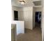 Hallway with a view to a cozy bedroom with natural light at 332 Dockside Ct, Las Vegas, NV 89145