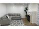 Cozy living room with a fireplace and comfortable seating area at 332 Dockside Ct, Las Vegas, NV 89145