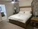 Comfortable bedroom with a king-size bed and adjoining bathroom at 332 Dockside Ct, Las Vegas, NV 89145