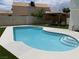 Gorgeous pool with steps, surrounded by pristine landscaping and a charming gazebo at 332 Dockside Ct, Las Vegas, NV 89145