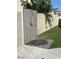 Outdoor shower offers a refreshing experience amidst lush landscaping, enhancing backyard amenities at 332 Dockside Ct, Las Vegas, NV 89145