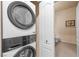 Convenient laundry area with modern washer and dryer units, offering efficiency and functionality at 3451 Desert Cliff St # 103, Las Vegas, NV 89129