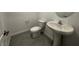 Bathroom with toilet and stand alone sink at 3493 Arcadian King Ave, Las Vegas, NV 89106