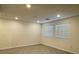 Bright bedroom with two large windows providing ample natural light at 3493 Arcadian King Ave, Las Vegas, NV 89106