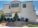 Charming home exterior featuring well-maintained landscaping, complemented by vibrant greenery at 3493 Arcadian King Ave, Las Vegas, NV 89106