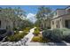 Picturesque view of the community walkway lined with green landscaping and homes at 3493 Arcadian King Ave, Las Vegas, NV 89106