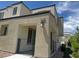 Home exterior featuring covered entry and private balcony with decorative ironwork at 3493 Arcadian King Ave, Las Vegas, NV 89106