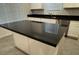Kitchen island with dark countertops and storage space, perfect for meal prep at 3493 Arcadian King Ave, Las Vegas, NV 89106