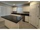 Modern kitchen featuring an island, stainless steel appliances and ample cabinet space at 3493 Arcadian King Ave, Las Vegas, NV 89106