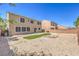 Backyard featuring desert landscaping, a paver patio, and mature trees for added privacy at 4016 Gaster Ave, North Las Vegas, NV 89081