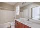 The bathroom features a large countertop and a shower/tub combo, providing convenience and comfort at 4016 Gaster Ave, North Las Vegas, NV 89081