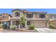 Charming two-story home with a well-maintained lawn and inviting curb appeal at 4016 Gaster Ave, North Las Vegas, NV 89081