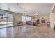 Spacious living room features tile floors, a fireplace, and backyard access at 4016 Gaster Ave, North Las Vegas, NV 89081