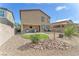 Backyard featuring a small grass area at 4332 Stardusk Falls Ave, North Las Vegas, NV 89084