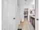Bright bathroom with dual sinks, granite countertops, and walk-in closet at 4332 Stardusk Falls Ave, North Las Vegas, NV 89084
