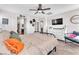 Spacious primary bedroom with neutral decor, ceiling fan, and ample natural light at 4332 Stardusk Falls Ave, North Las Vegas, NV 89084