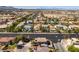 High-angle shot of residential neighborhood showing diverse homes, landscaping, and street layout at 4512 Long Horse Ct, Las Vegas, NV 89147