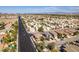 Overhead view of a neighborhood showcasing tree-lined streets and well-maintained homes at 4512 Long Horse Ct, Las Vegas, NV 89147