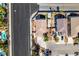 An aerial view of a home featuring an adjacent pool and well-kept landscaping at 4512 Long Horse Ct, Las Vegas, NV 89147