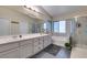 Bright bathroom with shower, tub, double sinks and ample counter space at 4512 Long Horse Ct, Las Vegas, NV 89147