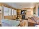 Cozy living room featuring a fireplace with a mounted flat screen television at 4512 Long Horse Ct, Las Vegas, NV 89147