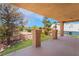 Second story balcony of home with landscaped backyard and palms at 5225 Sandy Cactus Ln, Las Vegas, NV 89149