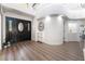 Bright foyer with wood floors, high ceilings, and an elegant front door, creating a welcoming entrance at 5225 Sandy Cactus Ln, Las Vegas, NV 89149