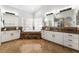 This luxurious bathroom is equipped with dual sinks, a tub, and a separate shower at 5225 Sandy Cactus Ln, Las Vegas, NV 89149