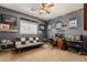 Cozy bedroom featuring a futon, desk and ceiling fan, perfect for relaxing or working at 532 Kavanagh Pl, Las Vegas, NV 89123