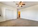 Bright bedroom with a ceiling fan, closet and neutral carpet, ideal for relaxation at 532 Kavanagh Pl, Las Vegas, NV 89123