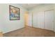 Bright bedroom featuring soft green walls, plush carpet and a large picture frame at 532 Kavanagh Pl, Las Vegas, NV 89123