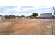 Large backyard with ample space and potential for various uses, surrounded by fencing for privacy and security at 5617 Alfred Dr, Las Vegas, NV 89108
